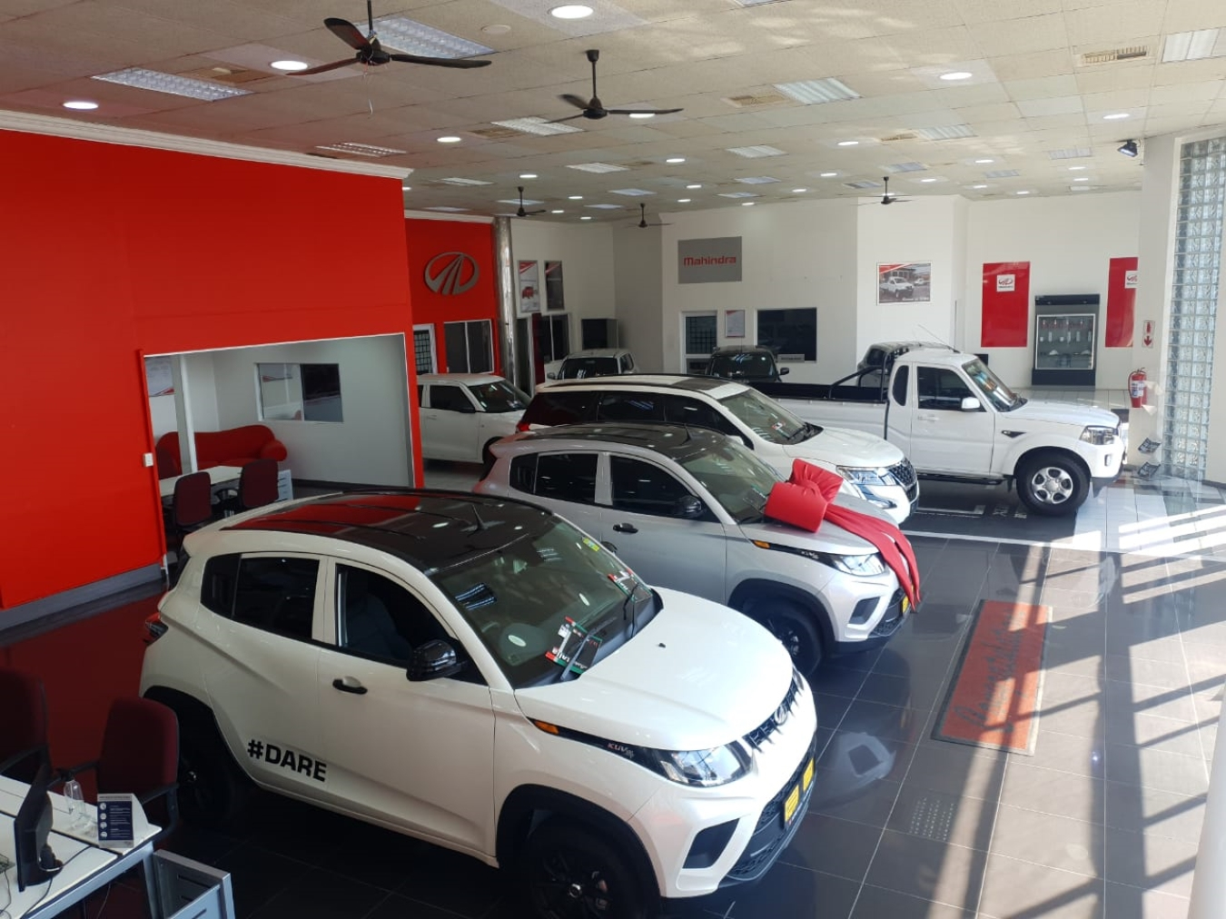 On the Mahindra showroom floor.